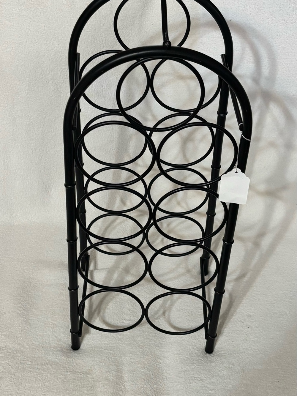 9-Bottle Metal Wine Rack in Black - Stylish Vertical Storage vintage